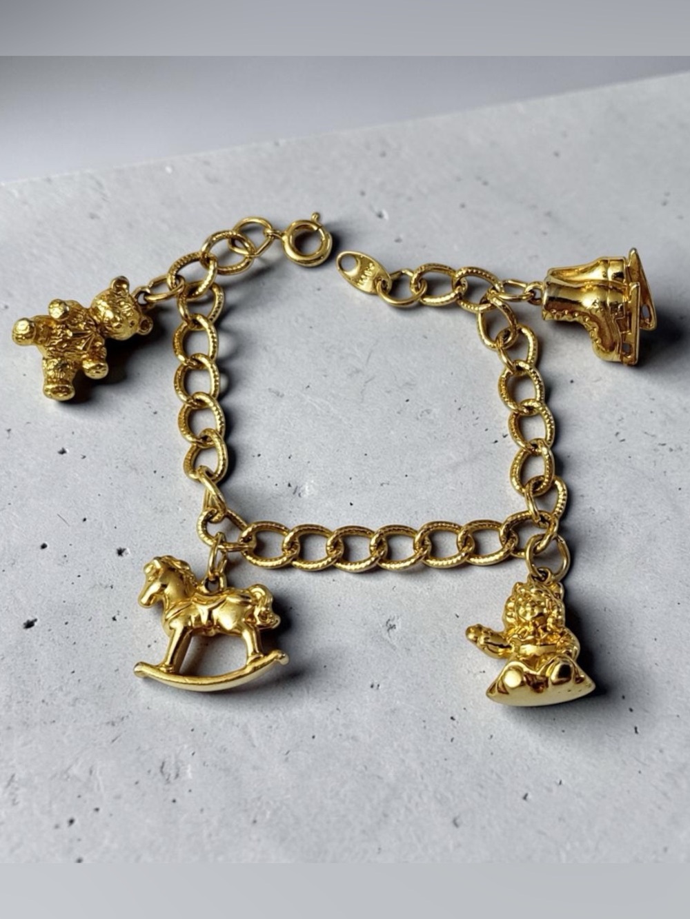Vintage Avon Gold Charm Bracelet Bear, Skates, Rocking Horse & Doll Size 6"
